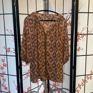 Sheer light weight swim suit cover.